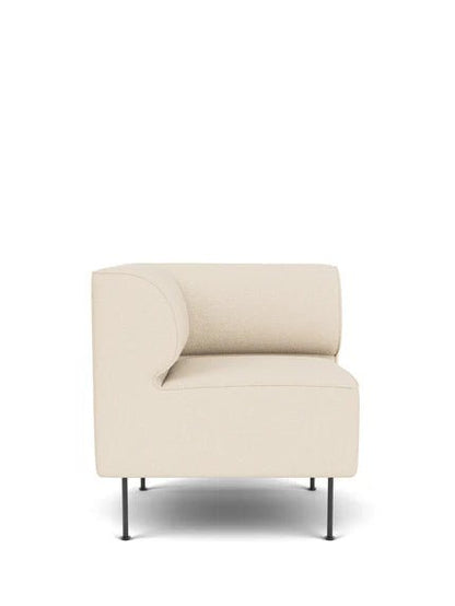 Eave Dining Sofa, Left Corner module, upholstered in a cream-colored Logan Jasmine fabric on thin black legs.