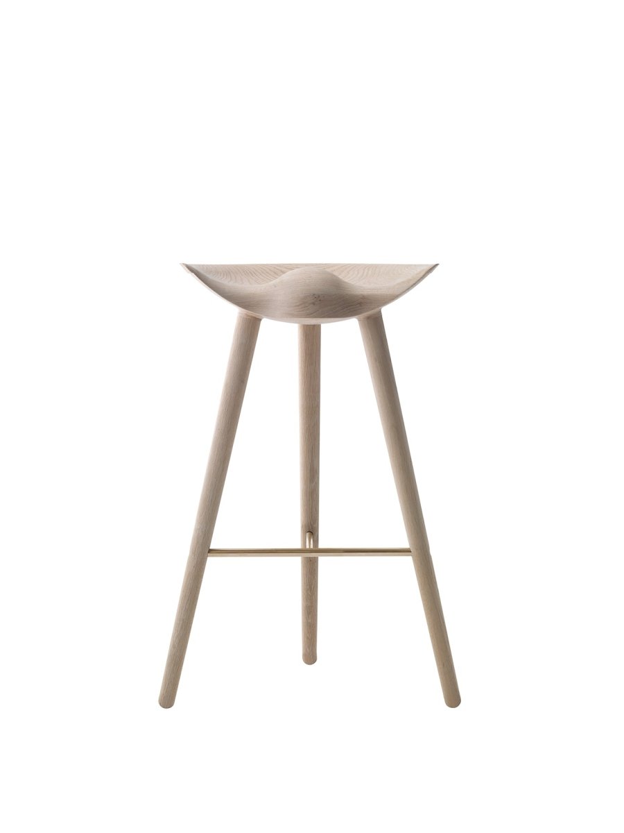 Front view of the ML42 Barstool in solid oak with a sculpted wooden seat and slim brass footrest against a plain background.