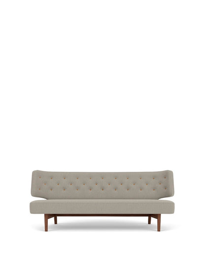 Front-on studio shot of the Radiohus Sofa P2 in light gray Re-Wool fabric with brown leather buttons and a dark walnut frame.