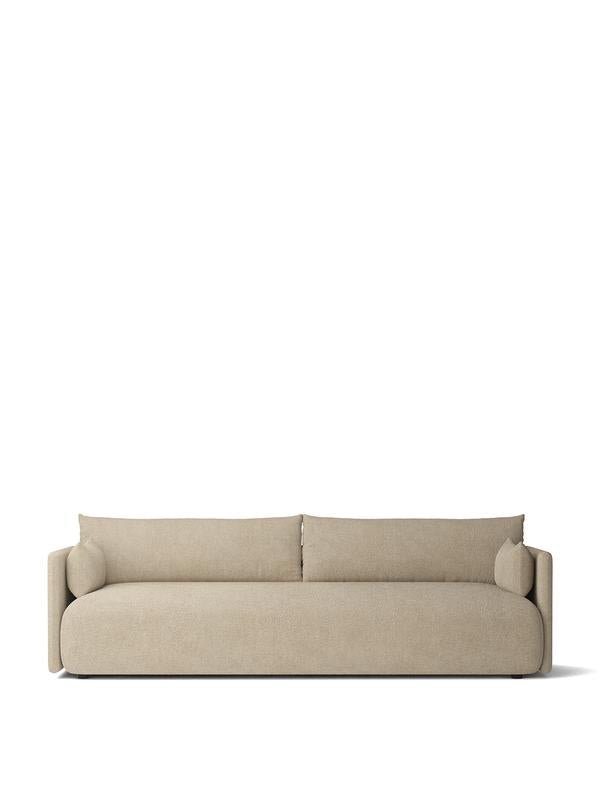 Front view of the Offset Sofa, a 3-seater upholstered in a light