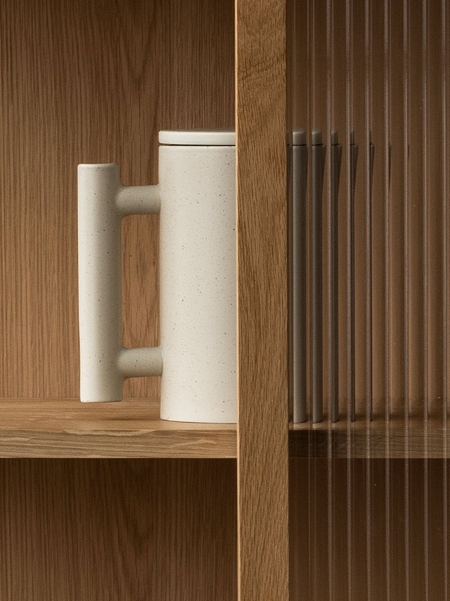 Curiosity Cabinet | Elegant oak cabinet by Mentze Ottenstein