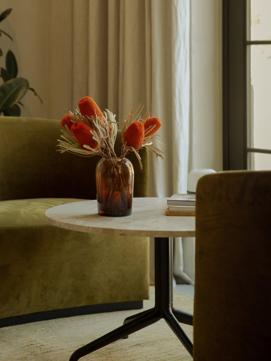 Harbour Column Table with a marble top in a living room setting.